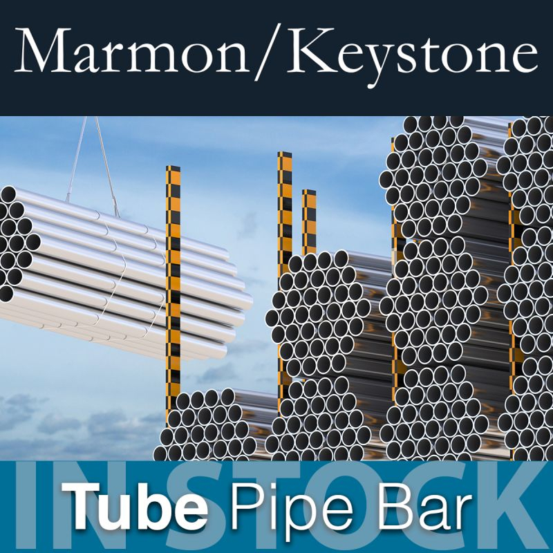 Marmon Keystone Stacks of metal tubes and pipes are shown; one bundle is being lifted by a crane. The text reads "Marmon/Keystone," "Tube Pipe Bar," "In Stock," emphasizing their role as a reliable tube pipe bar distributor in the metals supplychain.
