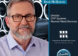 Marmon Keystone A man with glasses and a beard is smiling in front of a metallic, circular patterned background. Text reads: "Brad McQueen, Director ERP Systems, Marmon Metal Services—leading metals supply chain. Promotion earned! Marmon Metal Services logo included.